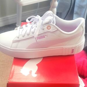 Pumas. Women's size 6. New. White and purple.